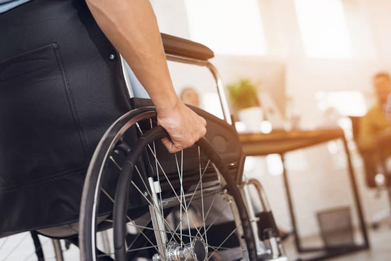 A disabled man in a wheelchair seeking social security in Los Angeles. 